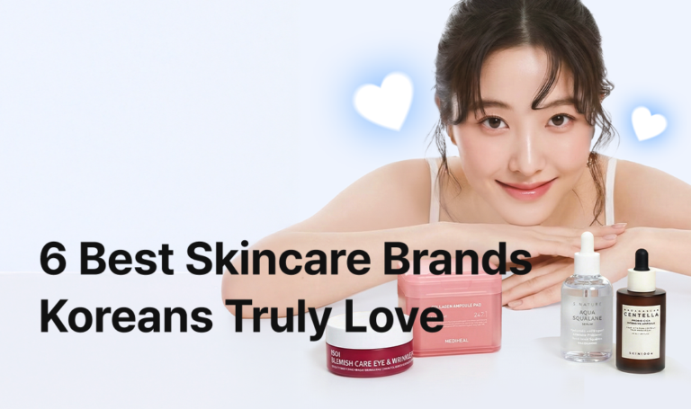 A promotional banner featuring a smiling woman resting her arms and looking at the camera against a soft sky-blue background. In front of her are popular Korean skincare products including MEDIHEAL Collagen Ampoule Pads, ISOI Blemish Care Eye & Wrinkle Patch, S.NATURE Aqua Squalane Serum, and SKIN1004 Madagascar Centella Ampoule. The text “6 Best Skincare Brands Koreans Truly Love” appears prominently at the bottom.
