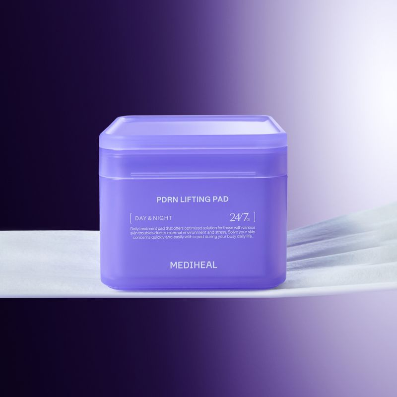 A sleek product visual showing MEDIHEAL’s purple square container of PDRN Lifting Pad placed against a soft purple gradient background. The packaging features the phrases “Day & Night” and “24/7,” emphasizing it as an elasticity-boosting treatment pad.