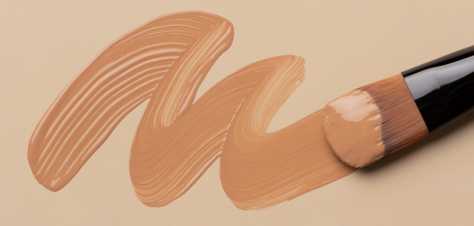 bb cream vs cc cream texture comparison with liquid base makeup spread by a brush, illustrating lightweight coverage and skin-like finish