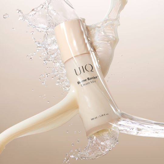 Dual-phase UIQ Biome Barrier Cream Mist texture showing cream and water layers designed for hydration layering in a korean glass skin routine