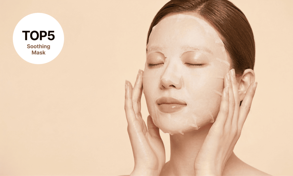 A serene close-up shot of a Korean woman with her eyes closed, wearing a detailed sheet mask with hands gently on her face against a warm sepia background. A white circular inset in the upper left corner displays 'TOP5' and 'Soothing Mask'.