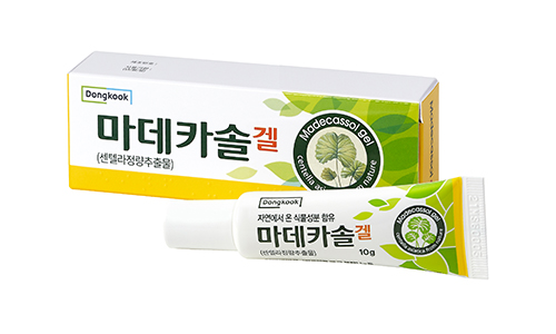 Madecassol Gel by Dongkook Pharmaceutical — a 10g tube with box packaging featuring centella asiatica leaf illustration