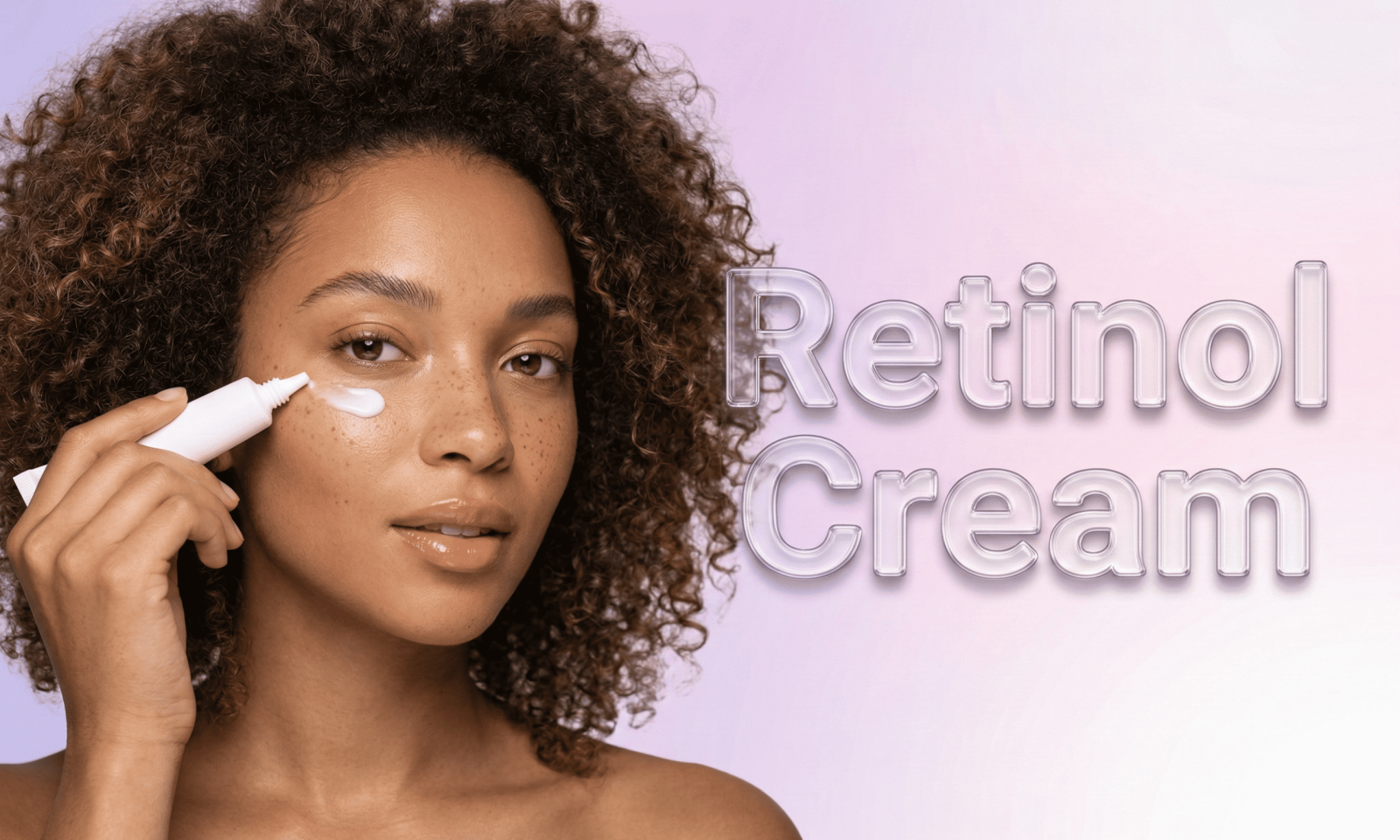 A young woman with curly hair and glowing, freckled skin applying skincare cream under her eye from a small white tube. On the right, large, transparent 3D text reads "Retinol Cream" against a soft pastel purple and pink gradient background.