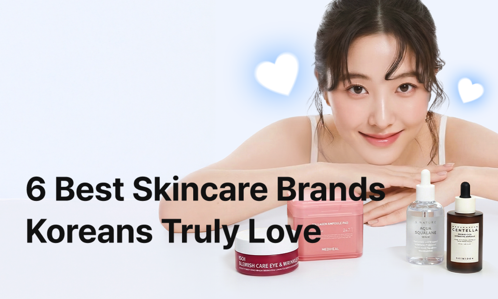 A promotional banner featuring a smiling woman resting her arms and looking at the camera against a soft sky-blue background. In front of her are popular Korean skincare products including MEDIHEAL Collagen Ampoule Pads, ISOI Blemish Care Eye & Wrinkle Patch, S.NATURE Aqua Squalane Serum, and SKIN1004 Madagascar Centella Ampoule. The text “6 Best Skincare Brands Koreans Truly Love” appears prominently at the bottom.