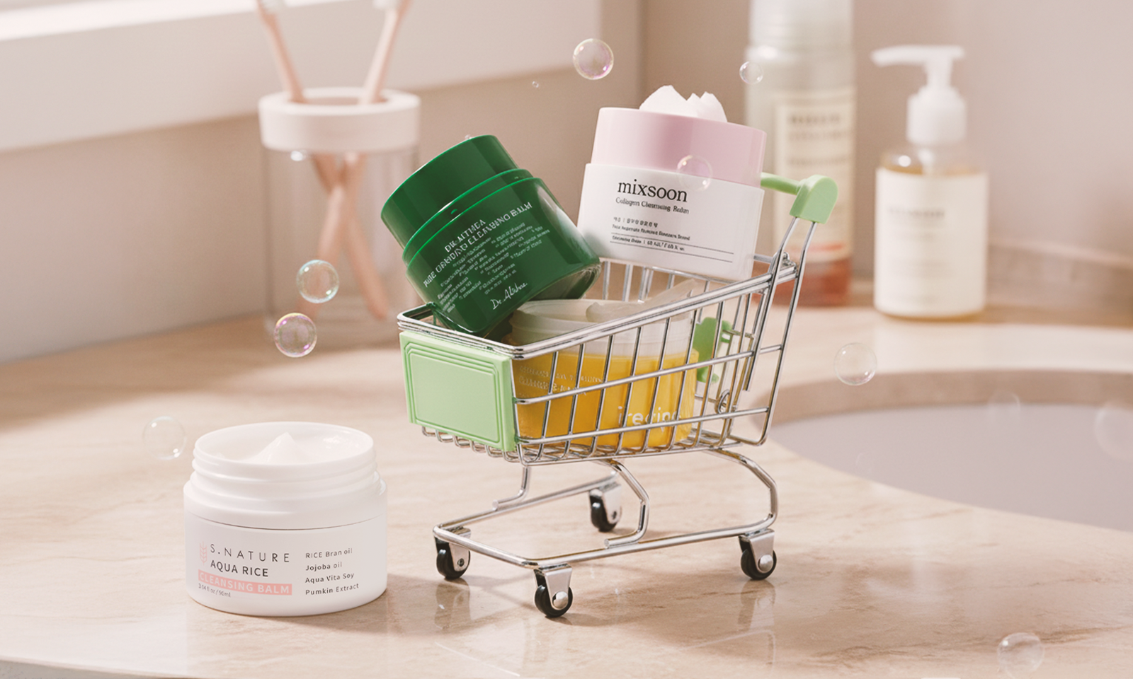 Assorted cleansing balm jars displayed in a mini shopping cart on a bathroom counter.